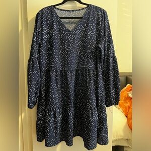 Navy blue dress with white polka dots.